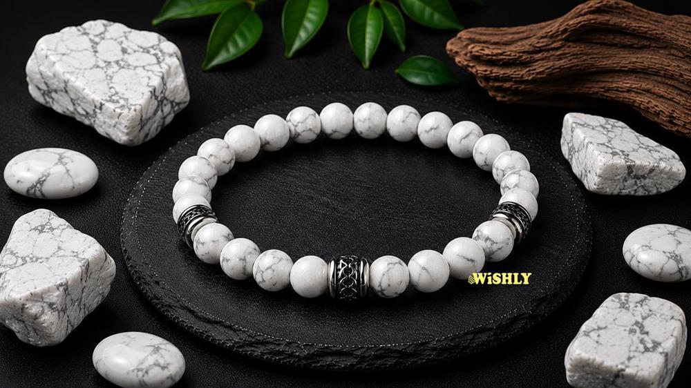 Howlite bracelet with polished white gemstone beads featuring natural grey veining displayed alongside rough Howlite stones on a dark textured slate surface.