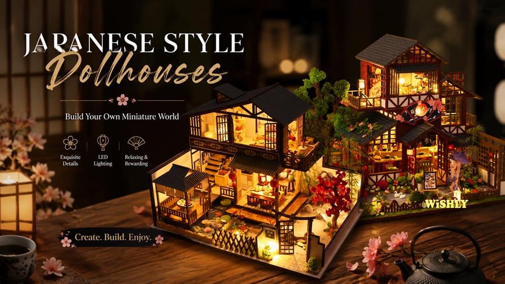 Japanese style DIY dollhouses with warm LED lighting, traditional architecture, and detailed miniature interiors displayed on a wooden tabletop.